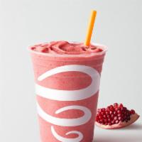 Pomegranate Paradise™ · Whirl'd Famous! Apple Pear Pomegranate Juice Blend, Mangos, Strawberries, Peaches.