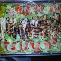 Grilled Chicken Salad · Lettuce, tomato, onions, black olives, cucumber and chicken.