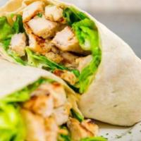 Chicken Caesar Wrap · Grilled chicken, romaine lettuce, Parmesan cheese, oregano, Caesar dressing and french fries