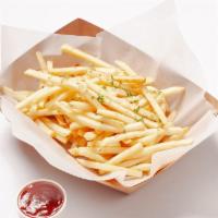 French fries · Shoestring french fries served with a side of ketchup
