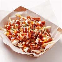Buffalo chicken fries · french fries, deep fried chicken breast, parsley, buffalo sauce, ranch dressing
