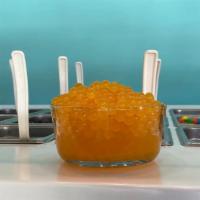 Mango Popping Boba · Our Mango Popping Boba are little balls filled with delicious fruit juice! And, NO, they are...