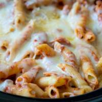 Pasta · Your choice of oven baked pasta served with 2 garlic knots.