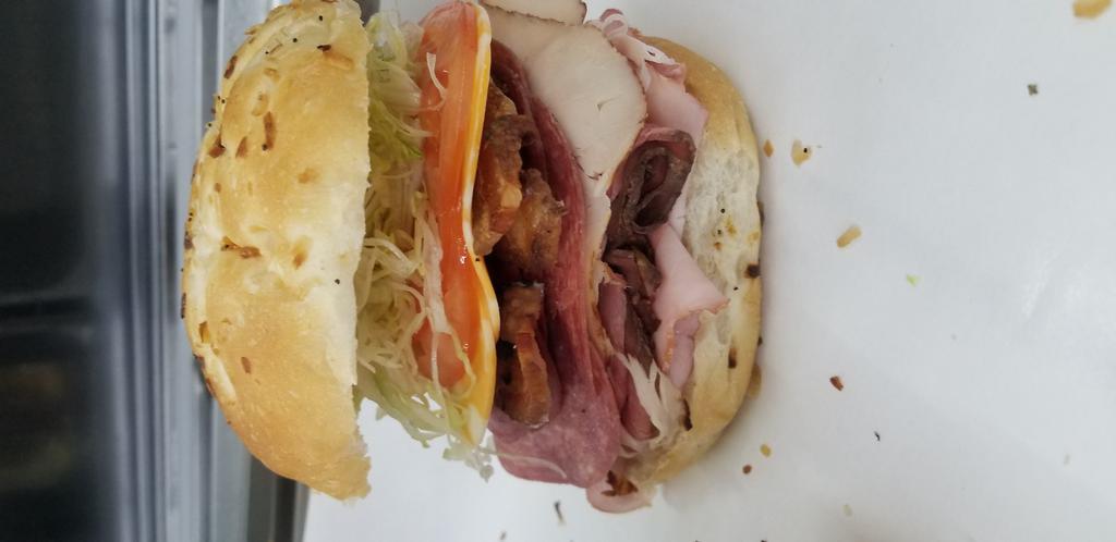 The Bacon Big Schott! · Ham, roast beef, turkey breast, salami, colby cheese, lettuce, and tomato on an onion bun with bacon!