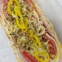 Schott's Italian Sub Sandwich · Ham, capicola, provolone, salami, oregano, mild banana peppers, lettuce, and tomatoes on a s...