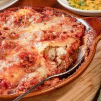 Lasagna Rustica · Handmade layers of pasta, house-made meat sauce, ricotta & mozzarella. (1220 cal)