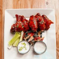 310 DEVIL WINGS · Our famous red hot chicken wings, tossed in our signature Red Devil sauce, served with our h...
