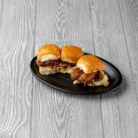 PULLED PORK SLIDERS  · Our signature beer-bbq pulled pork and home-style coleslaw on Torrance Bakery slider buns