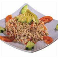 39. Cazuela Ceviche de Pescado  · Fish tanned in Lemon, scrambled with Tomato, Cucumber, Onion and minced Cilantro, served wit...
