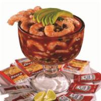 56.  Coctel de Camaron · Shrimp cooked  in water served with Tomato, Onion, Diced Cucumber, Avocado and Cilantro, Cov...