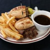 French Dip Sandwich · Roast Beef on a French roll  served with au jus. 