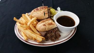 French Dip Sandwich · Roast Beef on a French roll  served with au jus. 