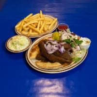Gyro Platter · A flavorful mixture of lamb and beef, prepared on a pita with tomatos, onions, feta cheese a...