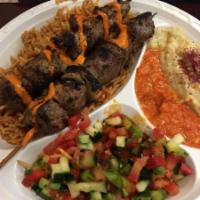 Kebab Combo Plate · 2 Kebabs of choice served with choice of salad and rice.