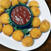 Breaded Mushrooms · 8 oz. of whole button mushrooms lightly coated with breading.