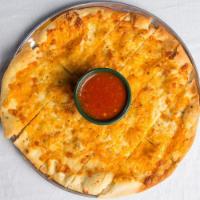 Beggars Cheesy Flatbread · Pizza crust brushed with garlic butter and seasoning, then baked with mozzarella and Parmesa...