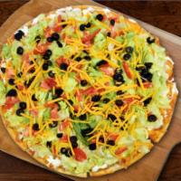 Taco Crust Thin Pizza · Chunky salsa, ground beef or chicken and cheddar cheese baked, then layered with sour cream,...