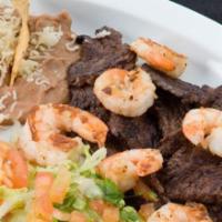 Carne Asada Con Camarones Dinner · Steak and shrimp.
