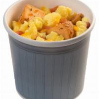 Breakfast Cup · Try our Breakfast Cup, roasted potatoes, scrambled eggs, bacon and cheddar cheese. 