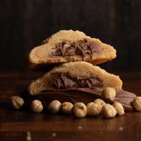 Peanut Butter Nutella Cookie  · This irresistible combination of our peanut butter batter mixed with the thick spread of coc...