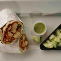 One Pound Spicy Chicken Wrap · A desi wrap with one pound tandoori boneless chicken thigh meat, tomatoes, onion and chilies...