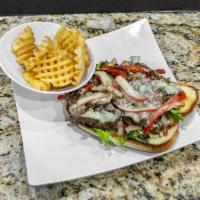 The Spot Philly · Steak or chicken smothered in grilled onion and green peppers served on a hoagie roll. Toppe...