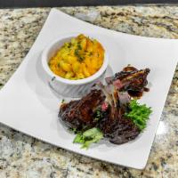 Grilled Lamb Chops · Three tender premium cut lamb chops. Grilled to perfection and served with 2 sides.