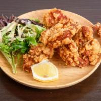Karaage Chicken  · 5 pieces. Juicy fried chicken thigh with an original garlic pepper served with tanaka's orig...