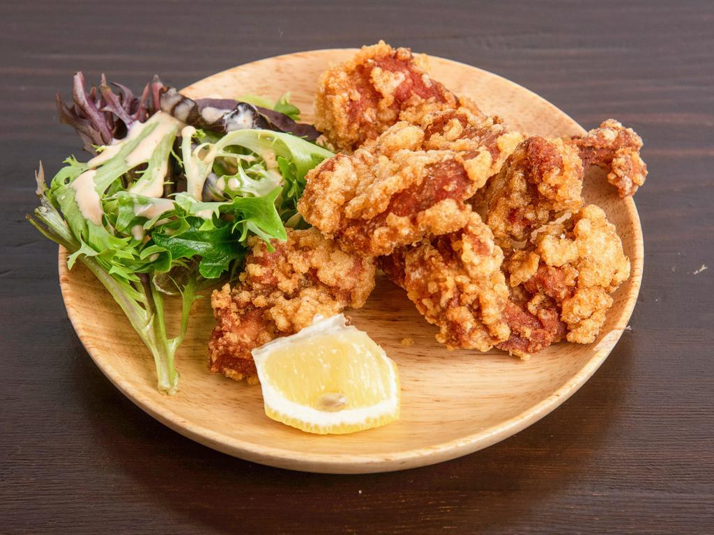Karaage Chicken  · 5 pieces. Juicy fried chicken thigh with an original garlic pepper served with tanaka's original spicy mayonnaise.