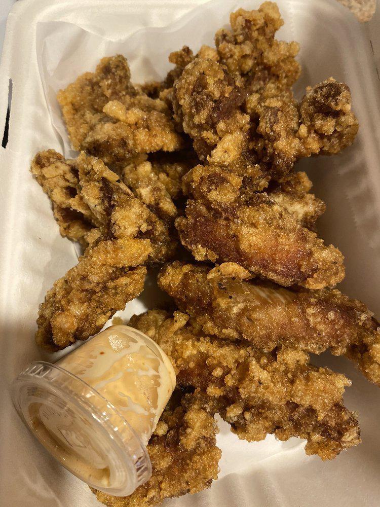 Crispy Chicken Wings · Crispy fried chicken wings seasoned with Tanaka's original chili seasoning.