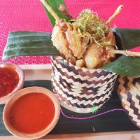 Red Curry Frog Legs · Deep fried frog legs marinated in red curry. Gluten free. 