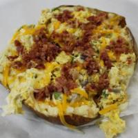 7. Anytime Breakfast Baked Potato · Warm fluffy potato filled with scrambled egg, bacon, cheddar cheese, bell pepper and onions....