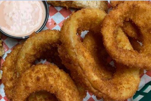 Onion Rings · Golden brown onion rings (ranch or honey mustard).