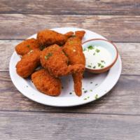 Jalapeno Shrimp Poppers · Creamy cheese filled jalapeno and shrimp poppers served with ranch dressing.