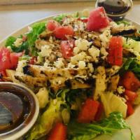 Grilled Chicken Salad · Your choice of fresh garden mix or Caesar salad topped with deliciously marinated chicken.