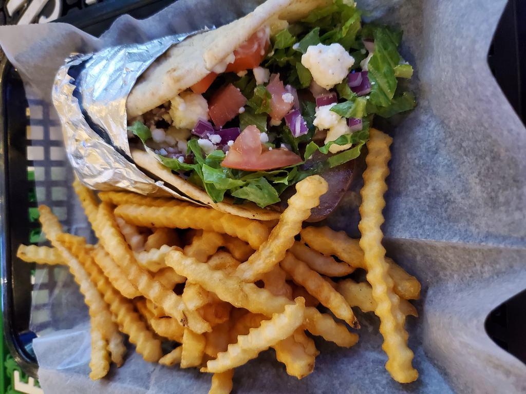 GYRO  · Pita loaded with Lamb/Beef shaved gyro meat, lettuce, tomato, onion, and Tzatziki cucumber sauce served with side of Chips or Fries
