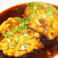 35. Chicken Egg Foo Young · Served with rice.