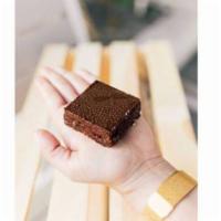 The Brownie · Coconut Sugar, Cacao Nibs, Cacao Butter, Coconut Oil, Water, Oat Flour, Chia Flour, Maple Sy...