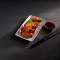 W2. Spicy Buffalo Wings 辣鸡翅 · Hot and spicy.