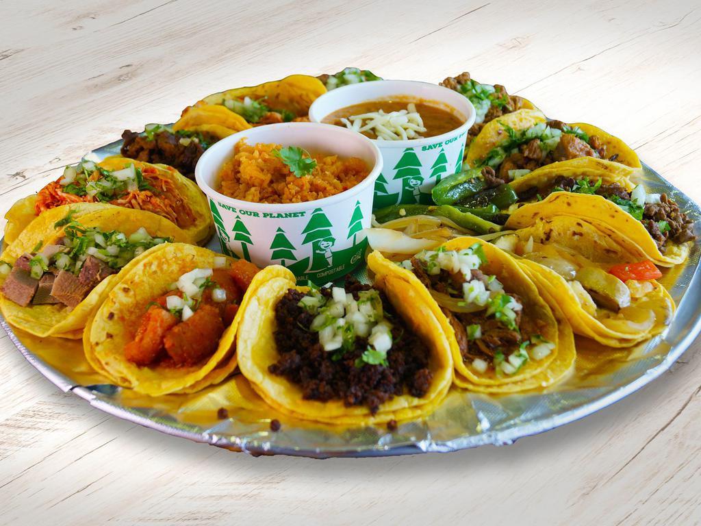 Taquiza Family Pack · 12 Street Tacos. Served with your choice of Protein, topped with cilantro and onions, corn or flour tortilla, choice of up to 5 proteins. Side of Grilled Jalapenos, Grilled onions, Limes and Salsas Choice, side of Mexican Rice and Refried Beans 8oz chips and salsa.
