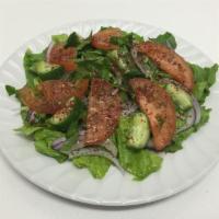 Mediterranean Salad · Lettuce, tomatoes, cucumbers, and onions topped with our special Mediterranean dressing. Veg...
