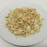 Cabbage Salad · Cabbage seasoned with lemon juice, olive oil, and spices. Vegetarian.