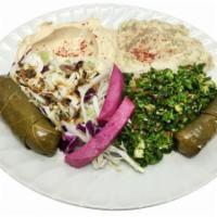 Vegetarian Combo Platter · Hummus, baba ghanoush, taboule, cabbage salad, sarma and pita bread.