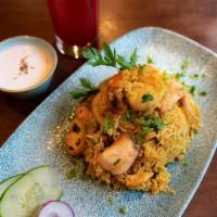 Shrimp And Salmon Biryani · Seasoned mixed rice.