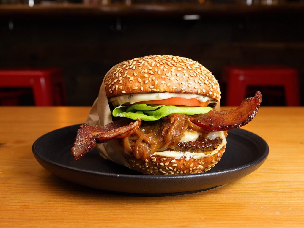 Heritage by Roam Artisan Burgers · By Roam Artisan Burgers. Applewood Smoked Bacon, Fontina, Butter Lettuce, Tomato, Caramelized Onions, and Herb Mayo. 

(Contains dairy, soy, nightshades, and eggs. We cannot make substitutions.)