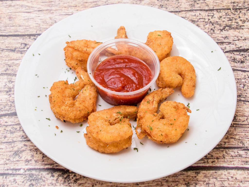 6 Shrimp · 6 butterflied shrimp. Hand-breaded, seasoned to perfection, and deep-fried. Also available grilled.
