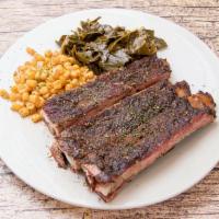 Ribs · 3 bones. 3 ribs slow hickory smoked, and served mildly spicy. Homemade BBQ sauce served on t...