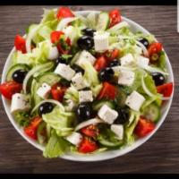 Greek Salad · Romaine lettuce, tomatoes, green peppers, onion, black olives and feta cheese.
