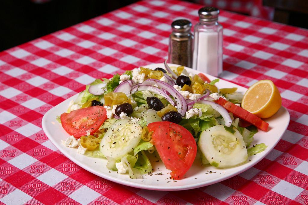 Athenian Salad · Romaine, tomato, red onion, cucumber, banana peppers, kalamata olives, crumbled feta and balsamic vinaigrette.