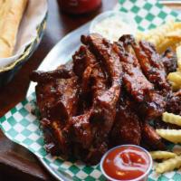 Full Slab Flame Grilled BBQ Back Ribs · Includes Choice of 1 SIDE & Garlic Bread & Slaw